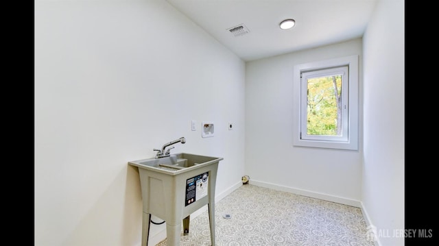 laundry area featuring washer hookup and hookup for an electric dryer