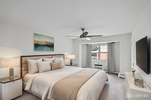 bedroom with an AC wall unit, light colored carpet, ceiling fan, and baseboard heating