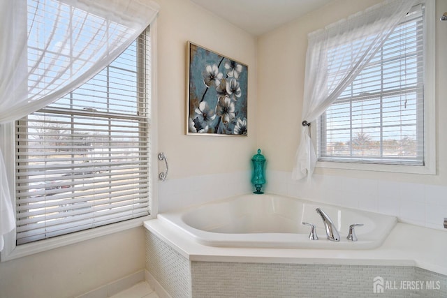 bathroom featuring a bath