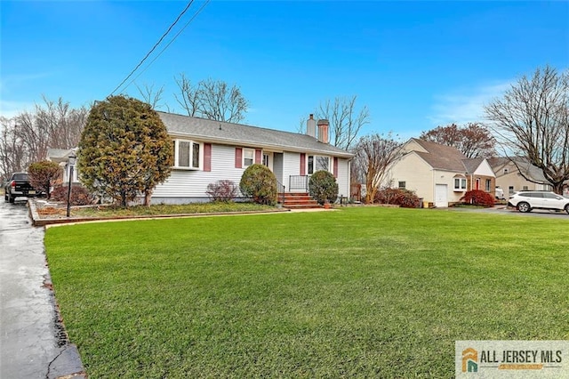 single story home with a front lawn, a chimney, and a residential view