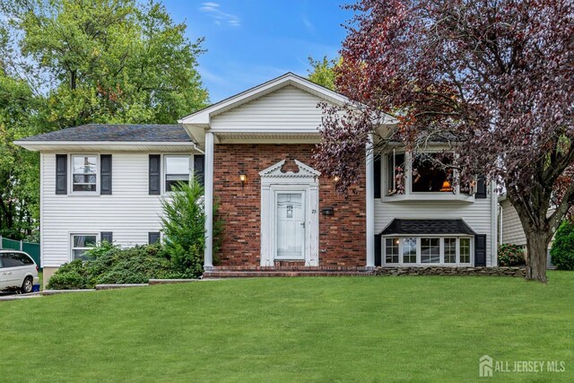 view of front of home with a front yard