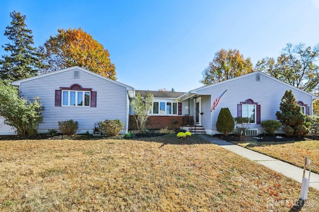 single story home with a front yard