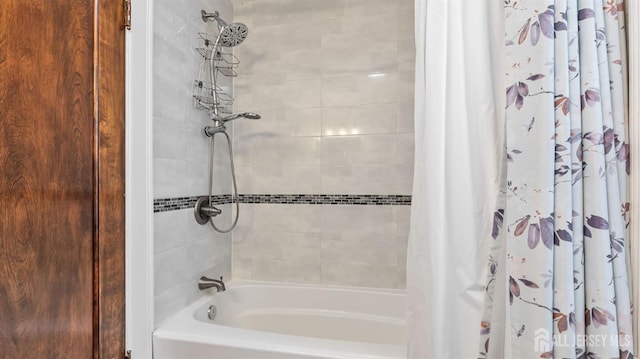 full bathroom featuring shower / bath combo with shower curtain