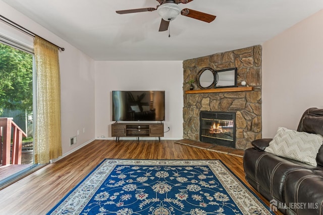 192 Middlesex Ave, Piscataway, NJ 08854 - living area with wood finished floors, ceiling fan, and a stone fireplace