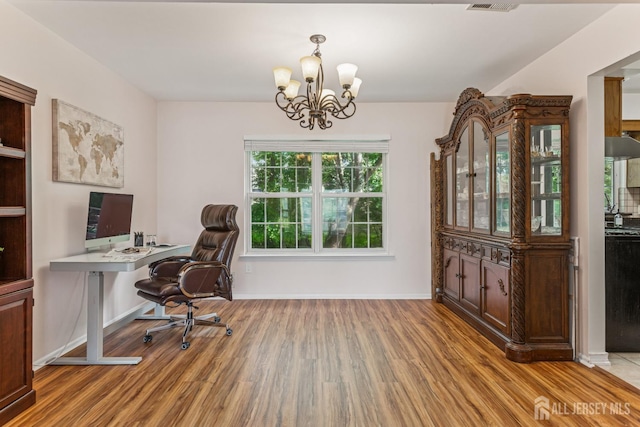 192 Middlesex Ave, Piscataway, NJ 08854 - office featuring wood finished floors and a chandelier