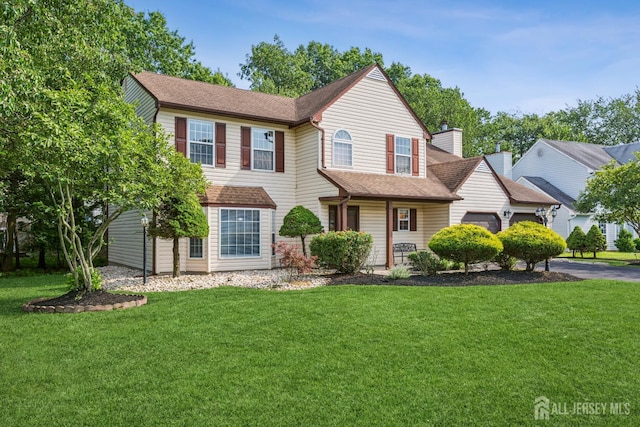 192 Middlesex Ave, Piscataway, NJ 08854 - view of front of property with a front yard, a shingled roof, an attached garage, and a chimney