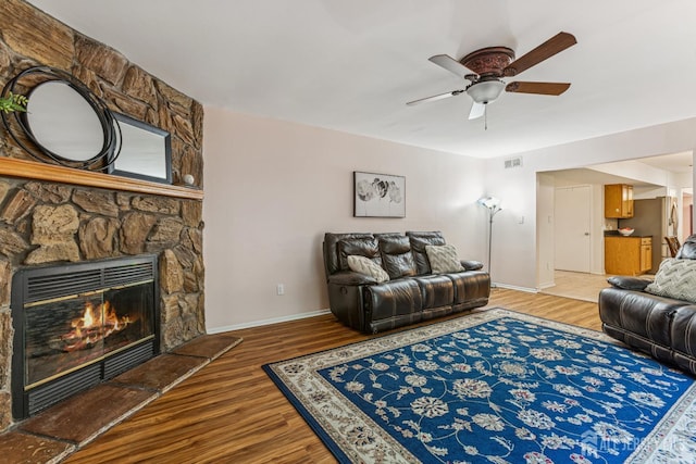 192 Middlesex Ave, Piscataway, NJ 08854 - living room featuring wood finished floors, ceiling fan, and a fireplace