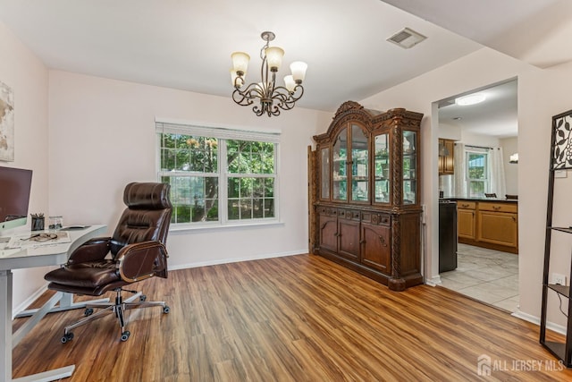192 Middlesex Ave, Piscataway, NJ 08854 - office space with light wood-style floors and a chandelier