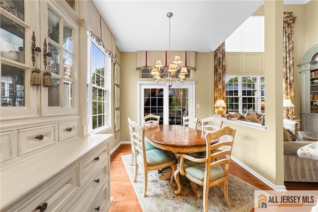 8 Tamarack Rd, Monroe, NJ 08831 - dining area featuring a chandelier and light wood-style floors