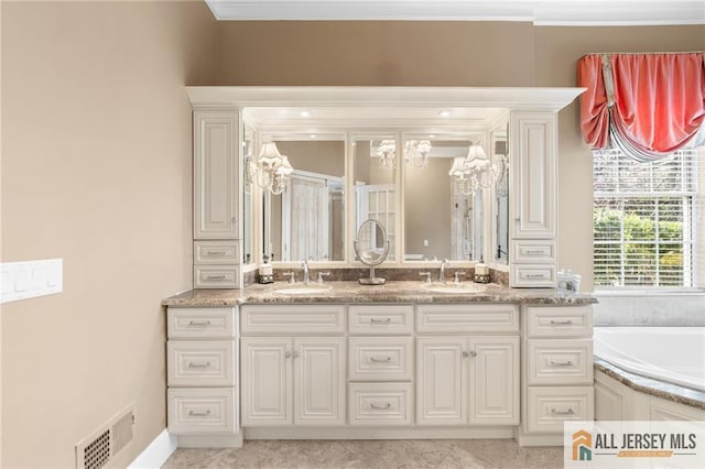 8 Tamarack Rd, Monroe, NJ 08831 - bathroom featuring double vanity, crown molding, a tub to relax in, and a chandelier
