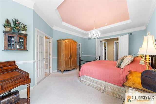 8 Tamarack Rd, Monroe, NJ 08831 - carpeted bedroom featuring a chandelier, a tray ceiling, and ornamental molding