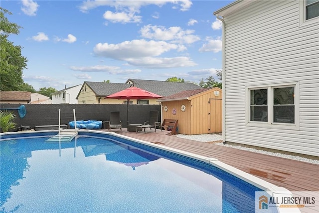 39 Evergreen Ter, Monroe, NJ 08831 - view of pool featuring a storage unit, a deck, and a fenced backyard