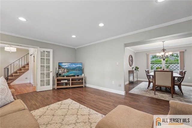 39 Evergreen Ter, Monroe, NJ 08831 - living room with stairs, a chandelier, wood finished floors, recessed lighting, and ornamental molding
