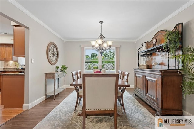 39 Evergreen Ter, Monroe, NJ 08831 - dining room with a chandelier, dark wood-style floors, and ornamental molding