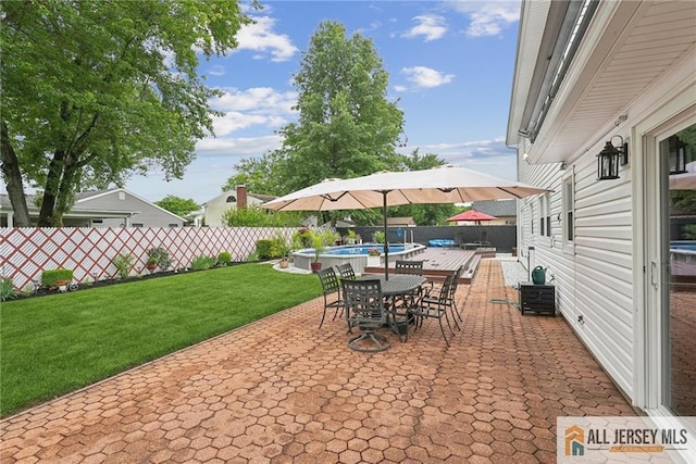 39 Evergreen Ter, Monroe, NJ 08831 - fenced backyard with a patio and outdoor dining area