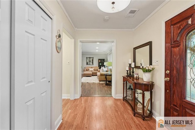 39 Evergreen Ter, Monroe, NJ 08831 - foyer entrance with light wood-style floors and crown molding