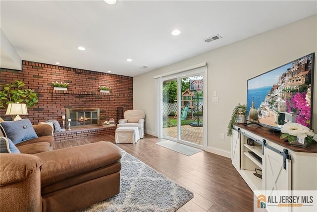 39 Evergreen Ter, Monroe, NJ 08831 - living area with a fireplace, recessed lighting, and wood finished floors