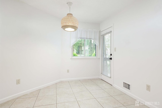 55 Smith St, Perth Amboy, NJ 08861 - spare room with baseboards and light tile patterned floors
