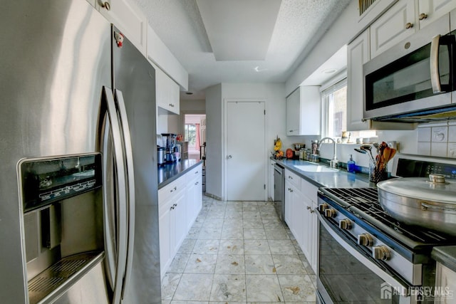 55 Smith St, Perth Amboy, NJ 08861 - kitchen with stainless steel appliances and white cabinets