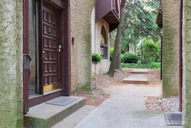 55 Smith St, Perth Amboy, NJ 08861 - property entrance featuring stucco siding
