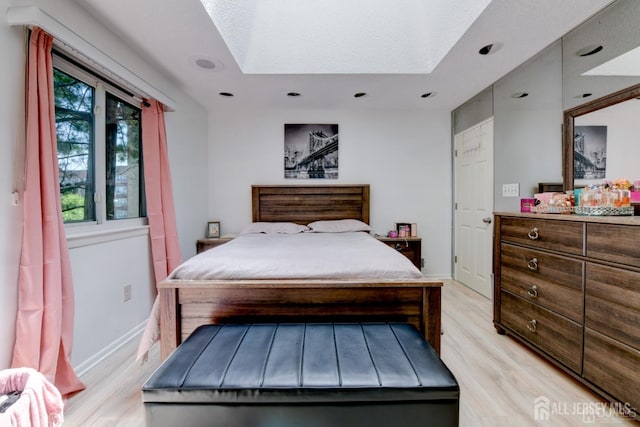 55 Smith St, Perth Amboy, NJ 08861 - bedroom with light wood-type flooring and recessed lighting