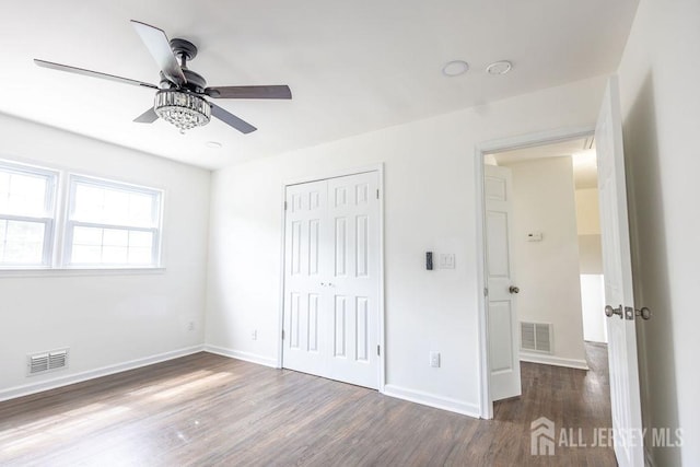 20 Wick Dr, Fords, NJ 08863 - unfurnished bedroom with wood finished floors, a closet, and ceiling fan