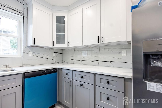 20 Wick Dr, Fords, NJ 08863 - kitchen featuring dishwashing machine, stainless steel fridge with ice dispenser, gray cabinetry, backsplash, and glass insert cabinets