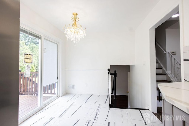 20 Wick Dr, Fords, NJ 08863 - unfurnished dining area with stairs and a chandelier