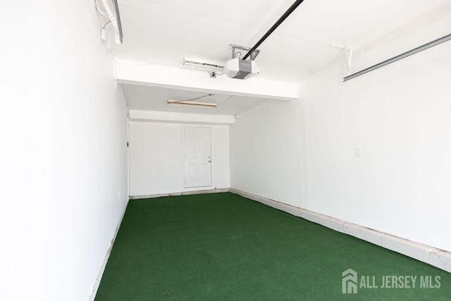 20 Wick Dr, Fords, NJ 08863 - garage featuring a garage door opener and baseboards