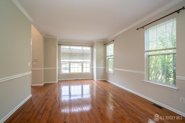 23 Heather Ct, Plainsboro, NJ 08536 - empty room featuring hardwood / wood-style floors, baseboards, and ornamental molding
