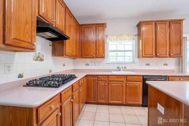 23 Heather Ct, Plainsboro, NJ 08536 - kitchen with under cabinet range hood, dishwasher, a sink, gas cooktop, and brown cabinets