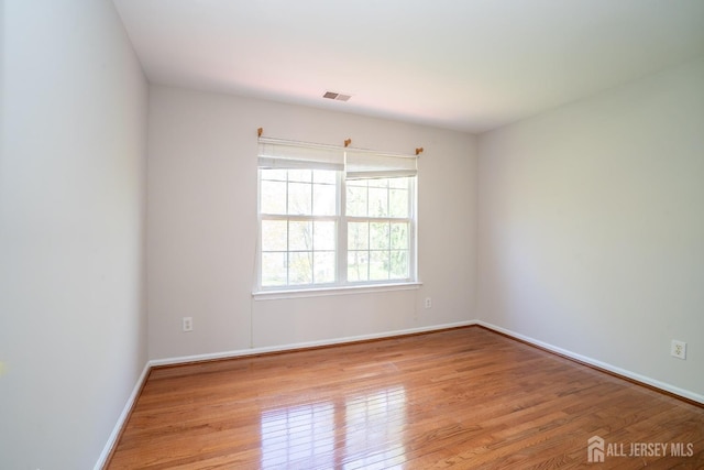 23 Heather Ct, Plainsboro, NJ 08536 - spare room featuring light wood finished floors and baseboards