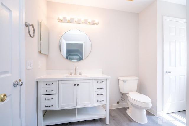 23 Heather Ct, Plainsboro, NJ 08536 - bathroom featuring toilet, baseboards, vanity, and wood finished floors