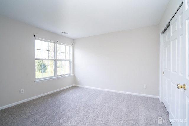 23 Heather Ct, Plainsboro, NJ 08536 - unfurnished bedroom with carpet floors, baseboards, and a closet