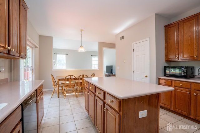 23 Heather Ct, Plainsboro, NJ 08536 - kitchen featuring dishwasher, black microwave, brown cabinets, light countertops, and a kitchen island