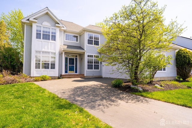 23 Heather Ct, Plainsboro, NJ 08536 - view of front of home with driveway, a garage, and a front yard