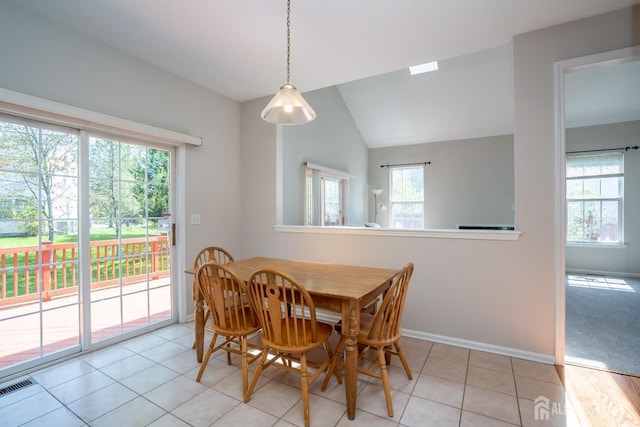 23 Heather Ct, Plainsboro, NJ 08536 - dining area featuring lofted ceiling, light tile patterned flooring, and baseboards