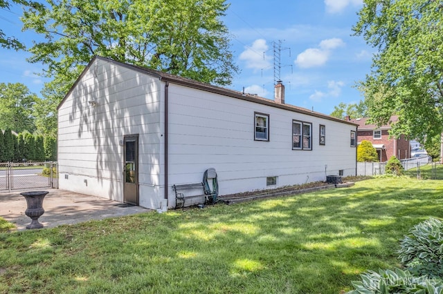 92 Maplewood Ave, Edison, NJ 08837 - back of house featuring a chimney and a patio area