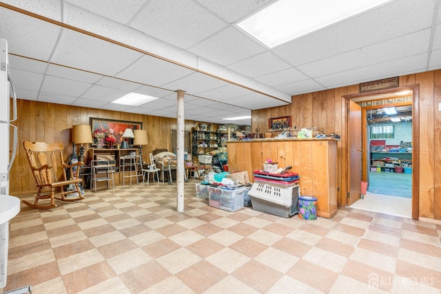 92 Maplewood Ave, Edison, NJ 08837 - below grade area featuring wooden walls, tile patterned floors, and a drop ceiling