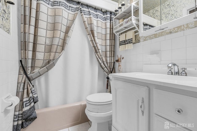 92 Maplewood Ave, Edison, NJ 08837 - full bathroom featuring vanity, shower / bath combination with curtain, tile patterned flooring, and tile walls