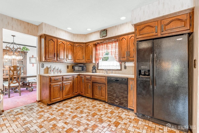 92 Maplewood Ave, Edison, NJ 08837 - kitchen with black appliances, a chandelier, light countertops, brown cabinetry, and recessed lighting