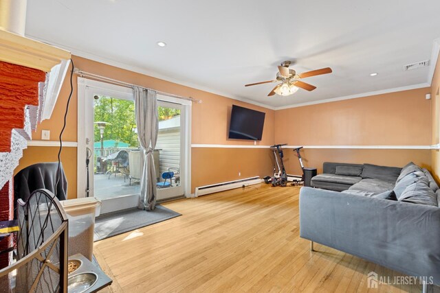 430 Wood Ave, North Brunswick, NJ 08902 - living area featuring a baseboard heating unit, ceiling fan, wood finished floors, ornamental molding, and recessed lighting
