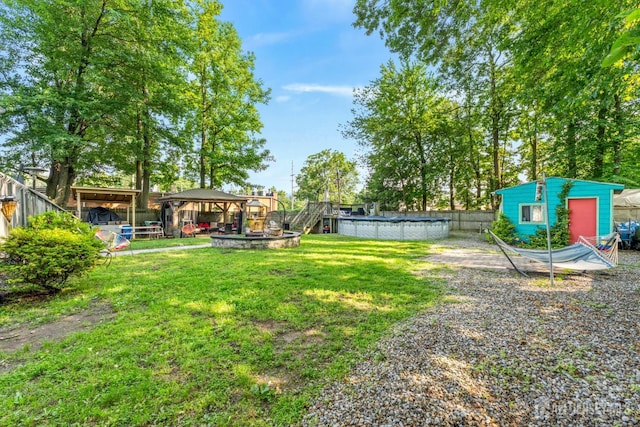 430 Wood Ave, North Brunswick, NJ 08902 - view of yard featuring an outdoor pool and a gazebo