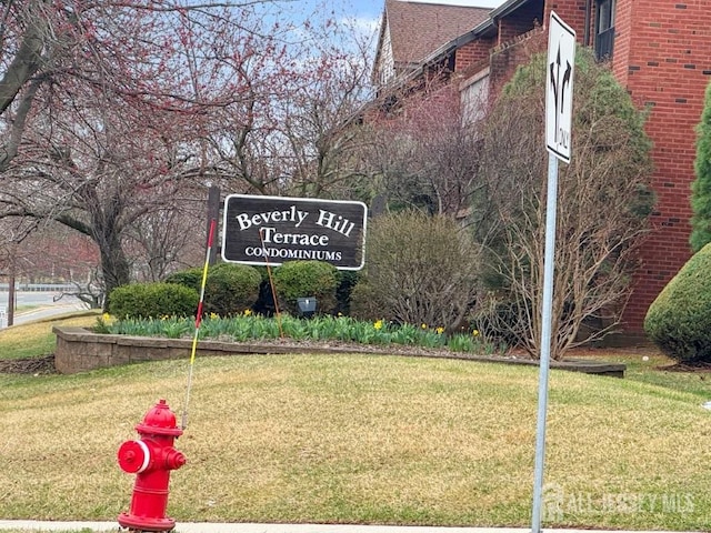 92 Beverly Hill Ter Unit D, Woodbridge Proper, NJ 07095 - community sign with a yard