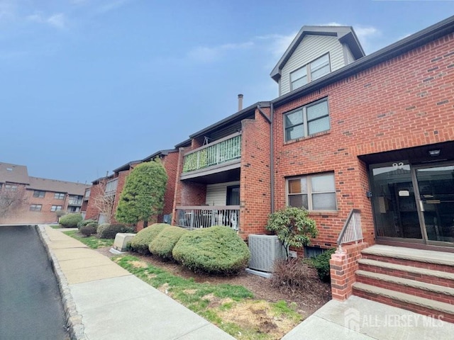 92 Beverly Hill Ter Unit D, Woodbridge Proper, NJ 07095 - view of building exterior featuring entry steps