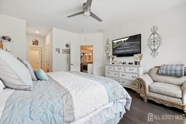 bedroom featuring a ceiling fan and dark wood-style flooring