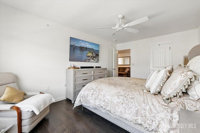 bedroom with a closet, ceiling fan, baseboards, and dark wood-style floors