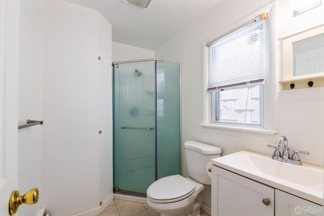51 Delafield St, New Brunswick, NJ 08901 - bathroom featuring toilet, a stall shower, vanity, and tile patterned flooring