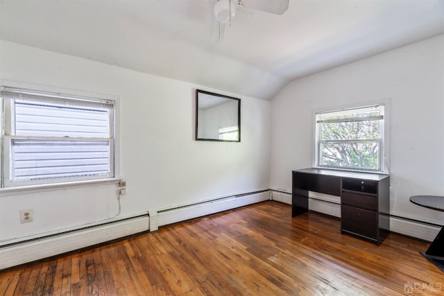 interior space featuring vaulted ceiling, dark wood-type flooring, and a baseboard radiator