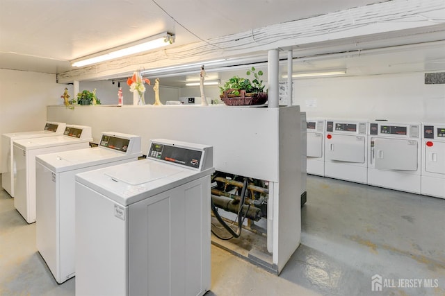 shared laundry area with washer and dryer